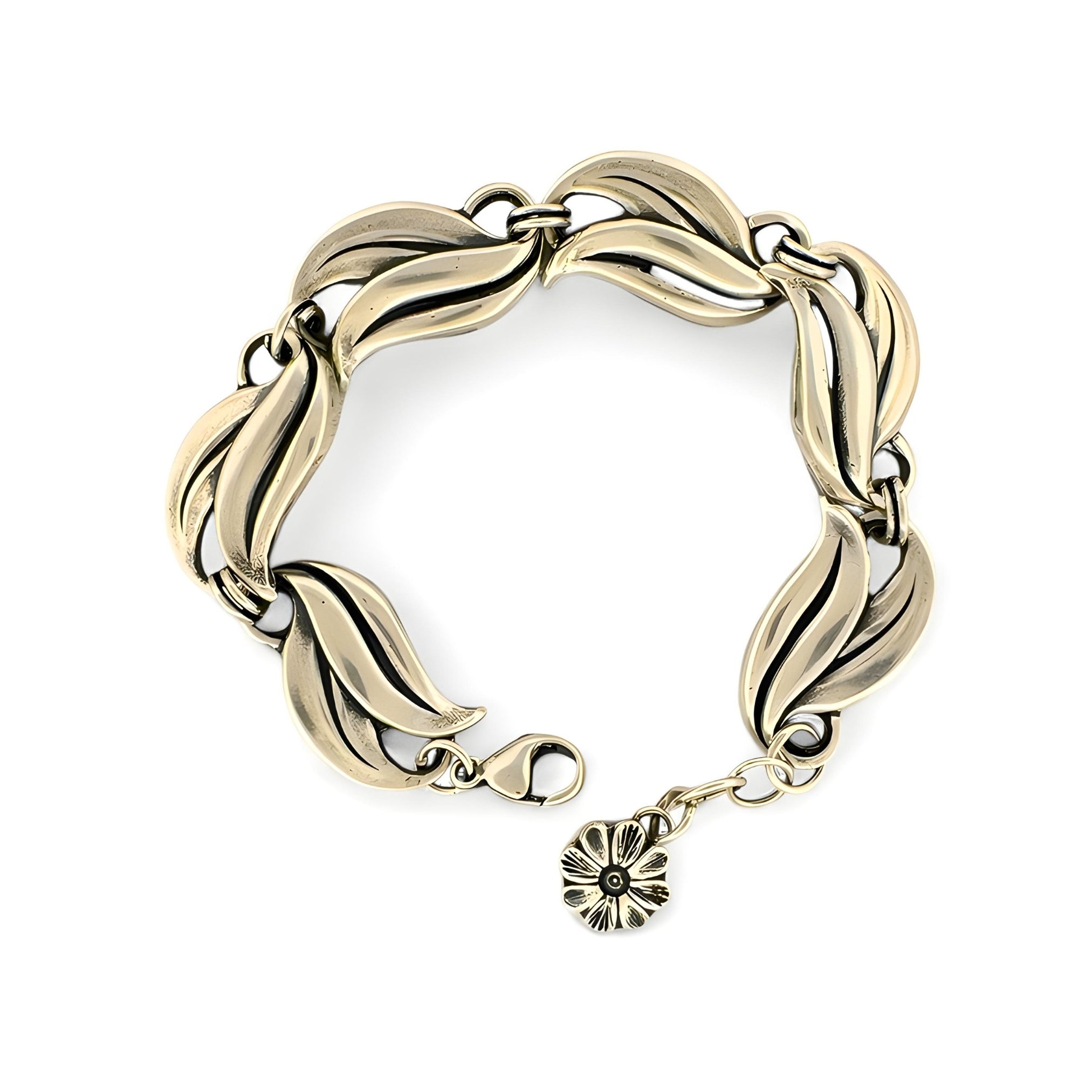 A gold-toned metal bracelet with a leaf-like segmented design and a small flower charm, shown on a plain white background.