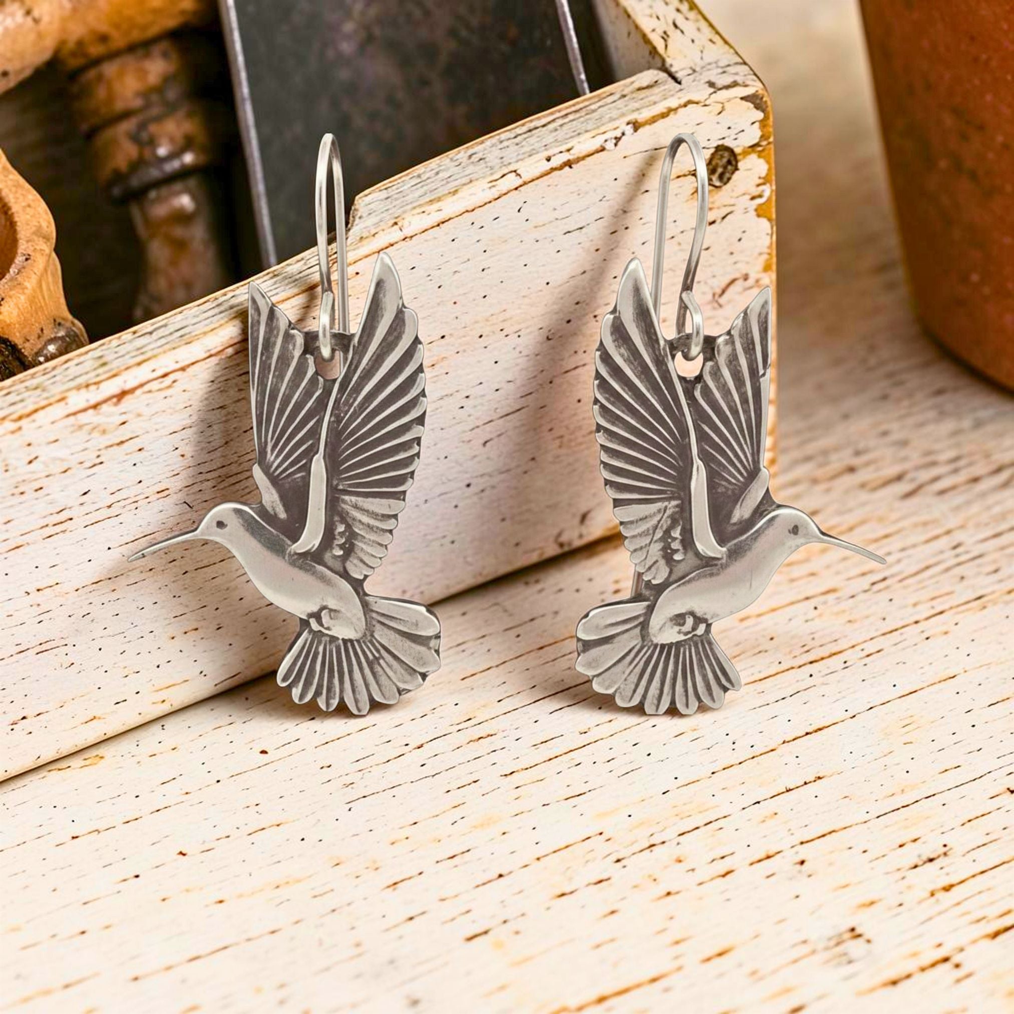 Handmade Sterling Silver Hummingbird Earrings Dangle Style Bird Lover Gift Perfect Nature Enthusiast Present Fine Silver Charms Detailed Wing Feather Engravings Antiqued Finish Lightweight Comfortable Daily Wear Jewelry Artisan Crafted