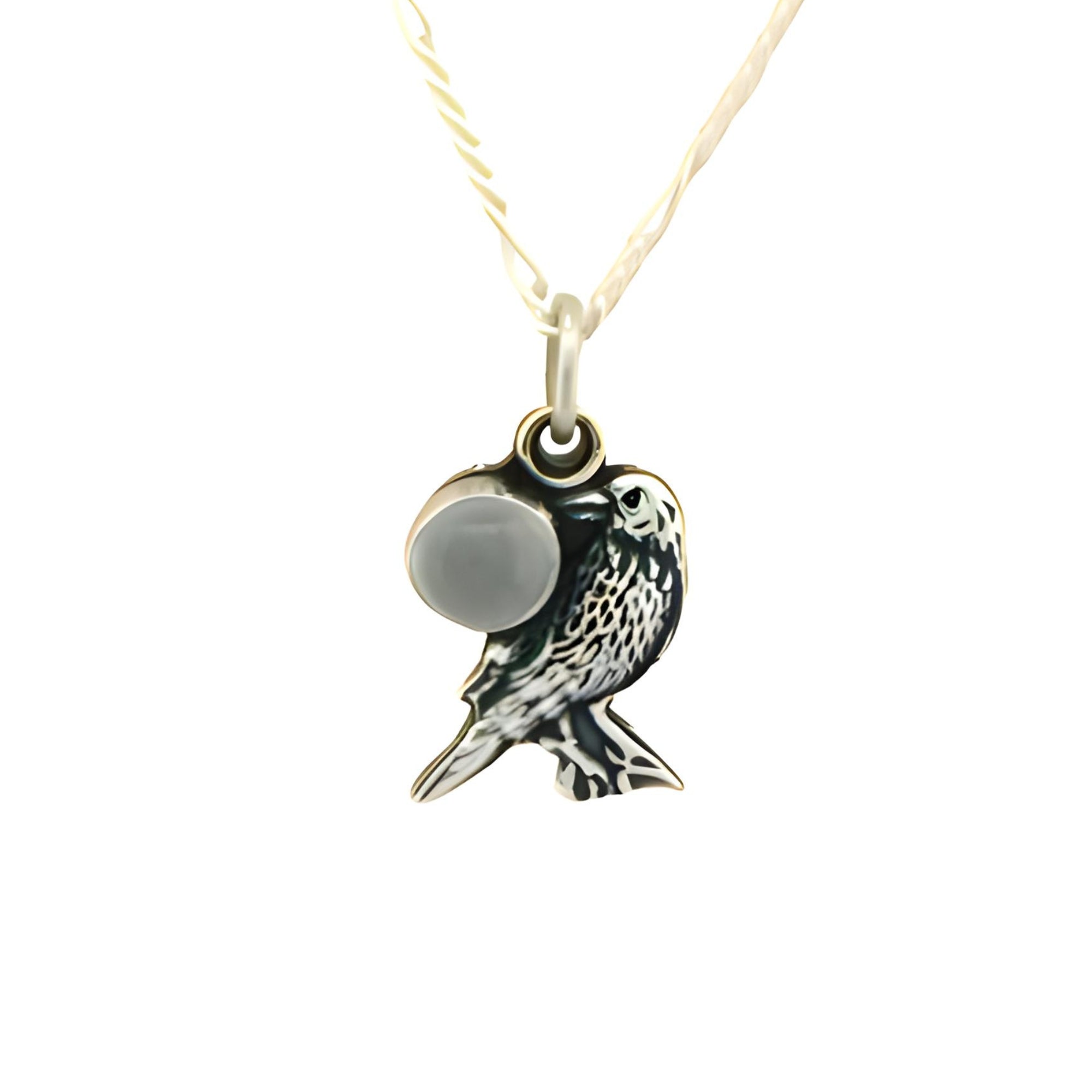 Bird-shaped pendant with a round stone on a white background